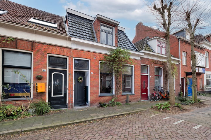 Bekijk foto van Warmoesstraat 47