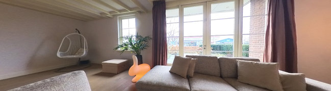 Heerlijke woonkamer met houthaard en veel lichtinval