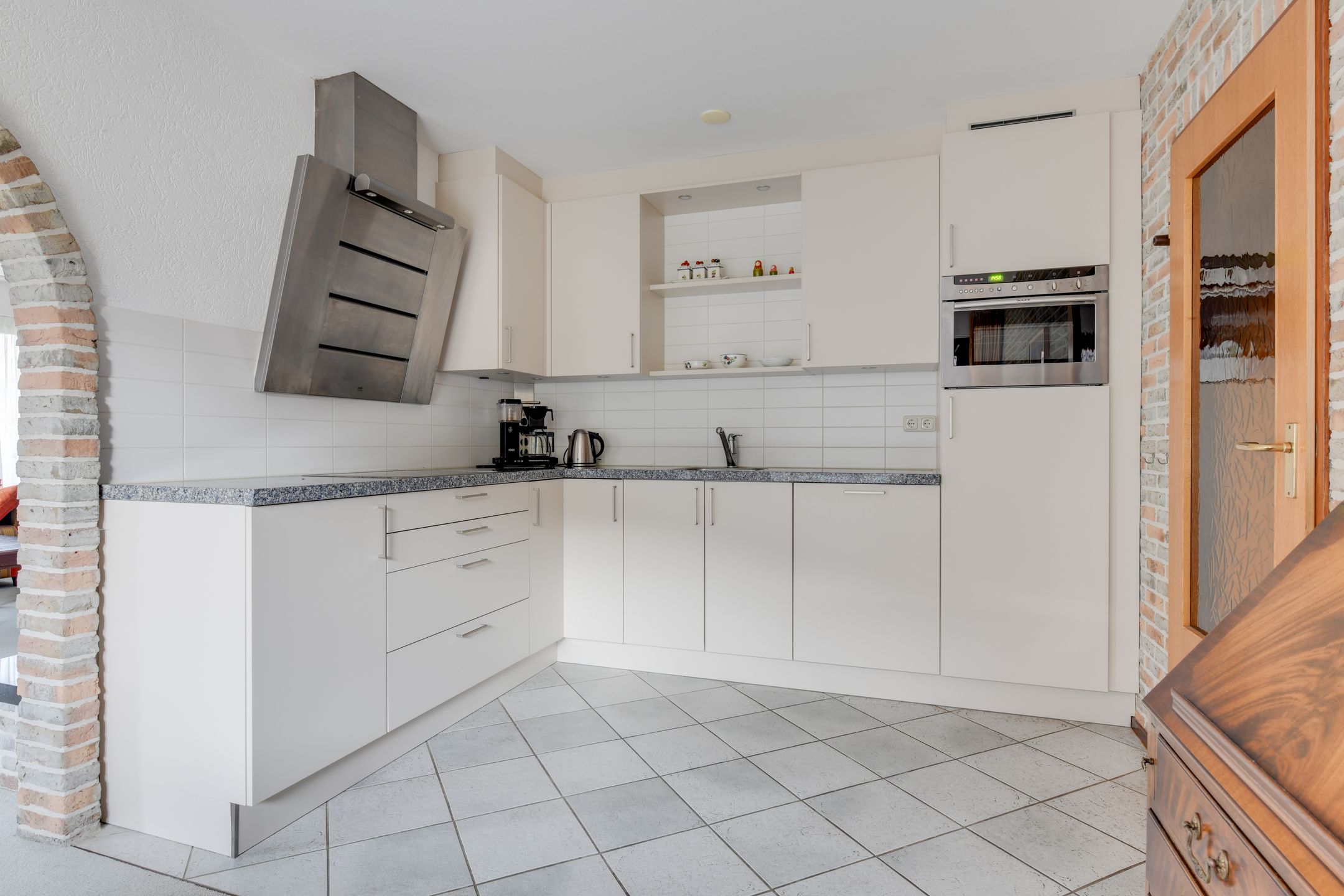 Foto 15 van Leeuwetand 19