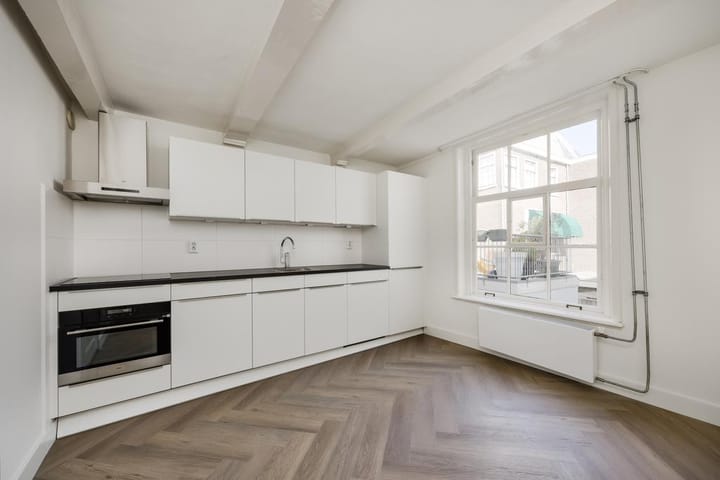 Foto 5 van Damstraat 23-C