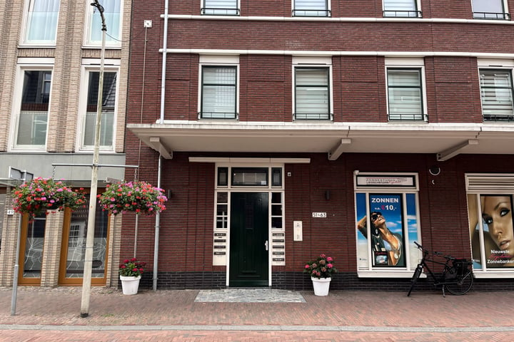 Bekijk foto 1 van Damstraat 57