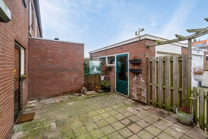 Foto 23 van Van Vollenhovenstraat 7