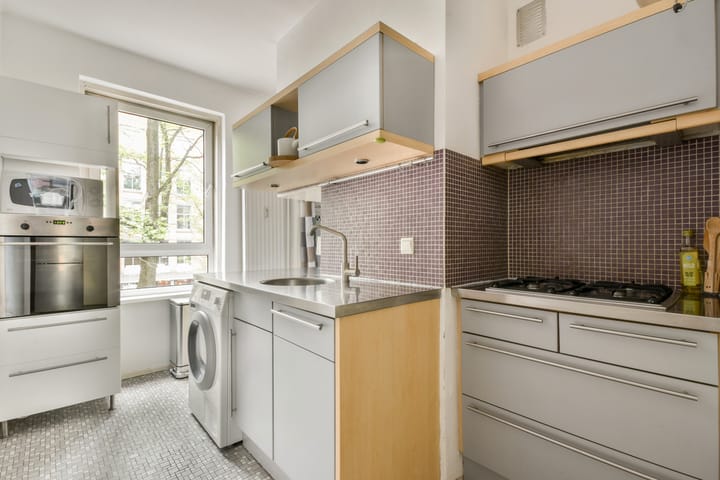 Foto 10 van Jodenbreestraat 110