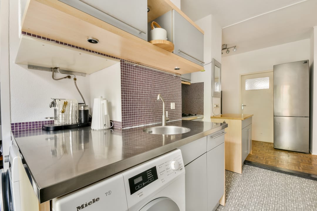 Foto 11 van Jodenbreestraat 110