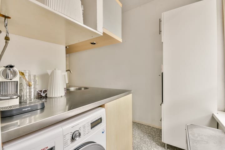 Foto 12 van Jodenbreestraat 110