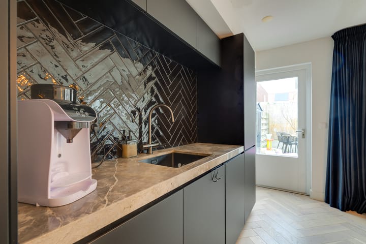 Foto 16 van Den Bommelstraat 7