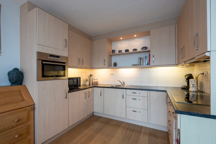 Foto 32 van Brederostraat 1-12