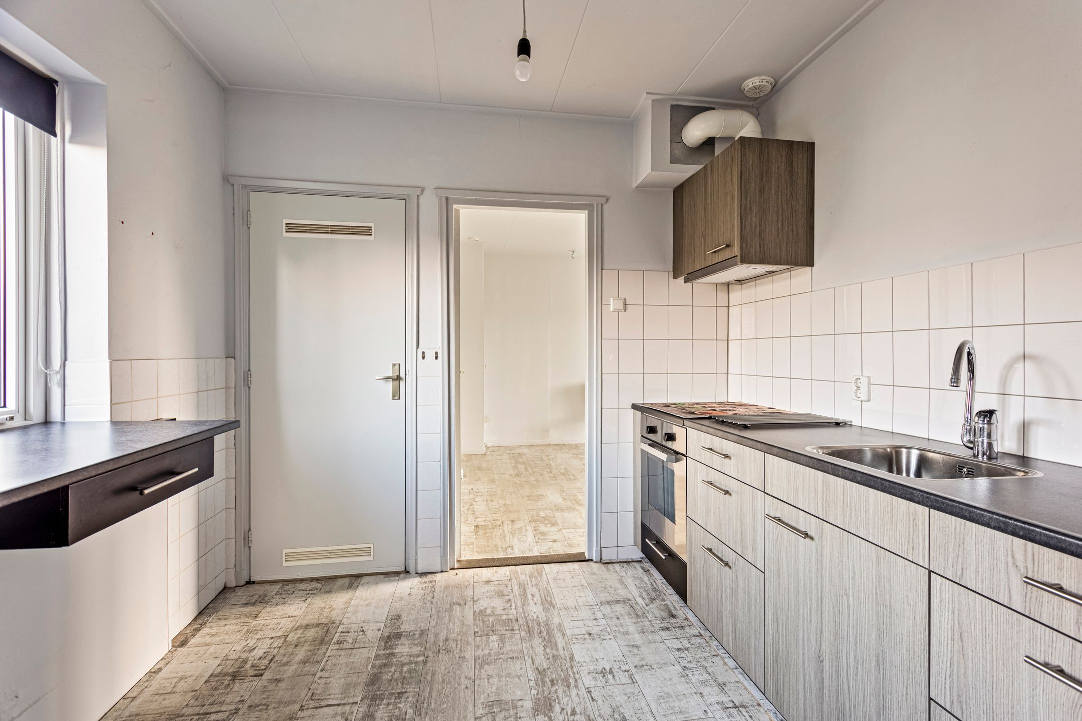 Foto 18 van Pastoor van Houtstraat 15