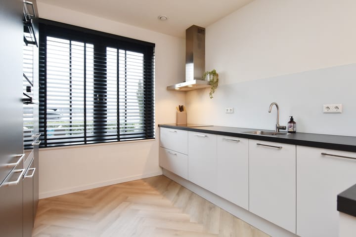 Foto 10 van Zonnebaars 21