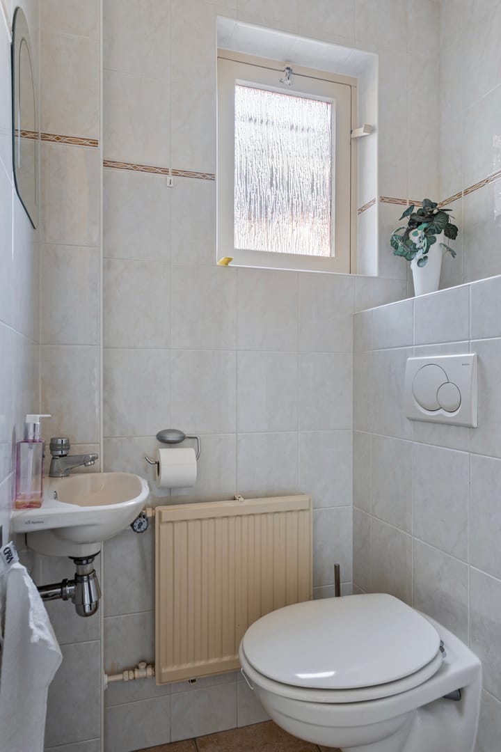 Foto 13 van Tienwoningenweg 23