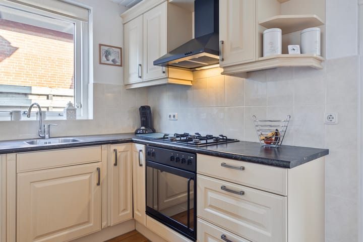 Foto 12 van Tienwoningenweg 23