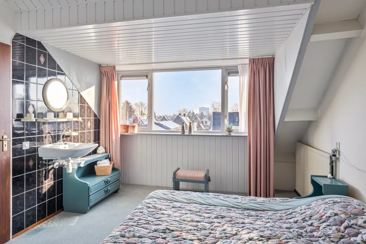 Foto 33 van Tienwoningenweg 23