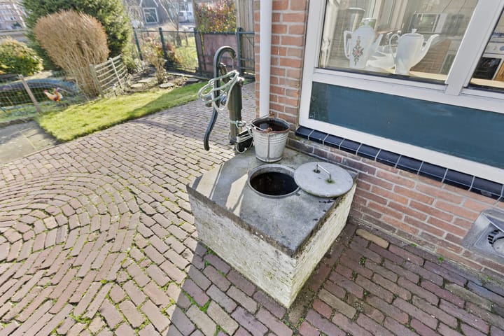 Foto 27 van Niesenoortsburgwal 1