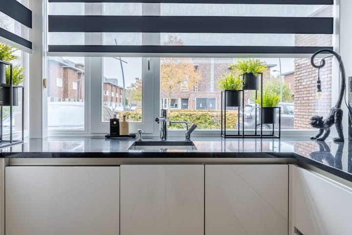 Foto 14 van Tegelzetter 33