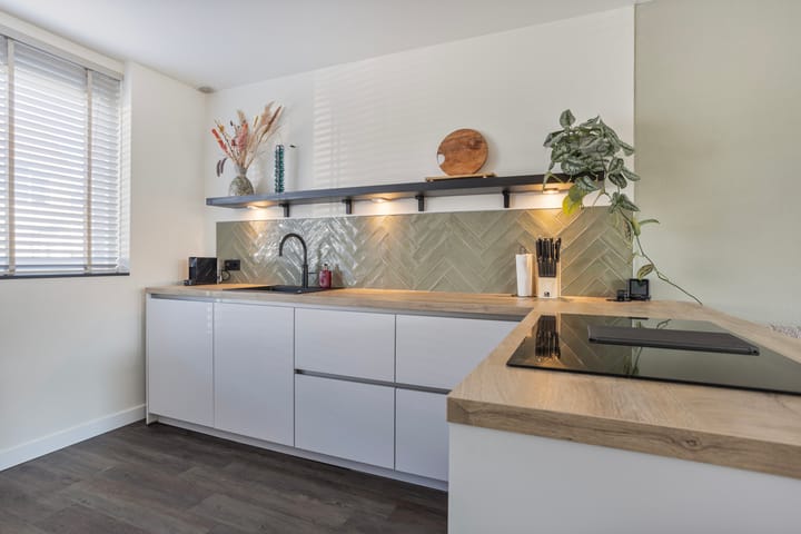 Foto 3 van Smaragd 55