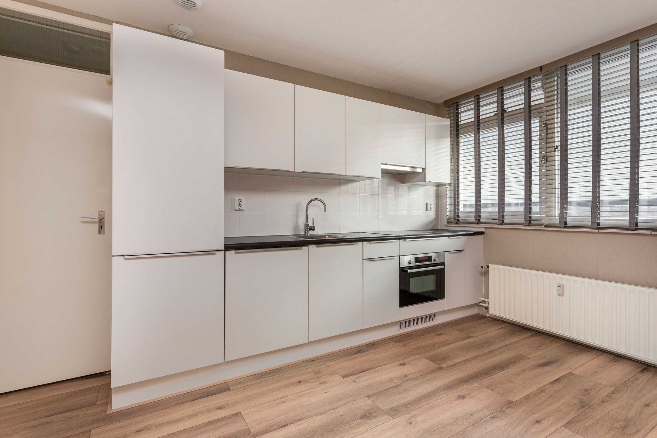 Foto 12 van Muntplein 125