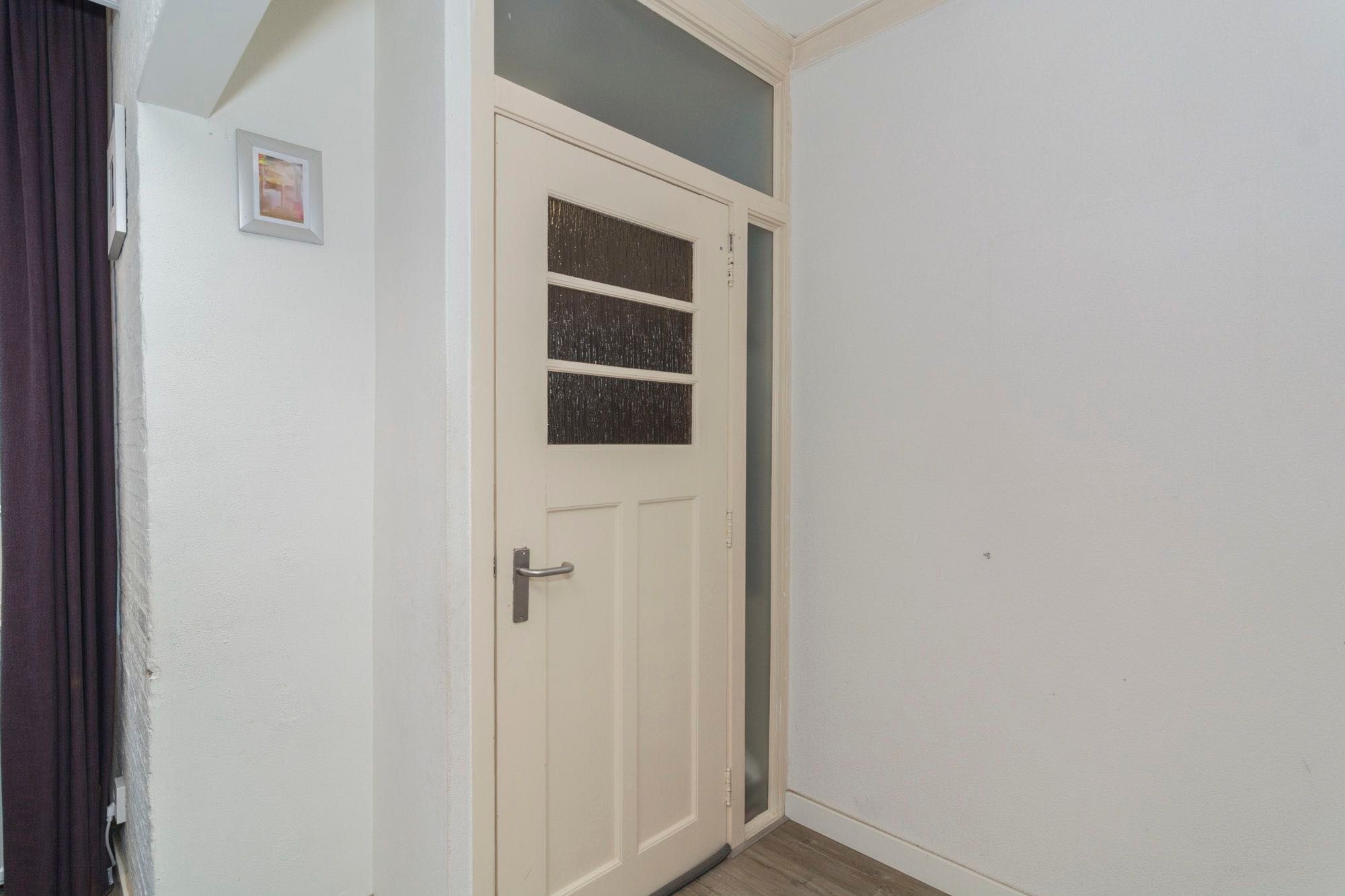 Foto 12 van Damstraat 42