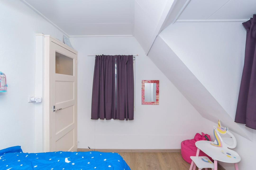 Foto 26 van Damstraat 42