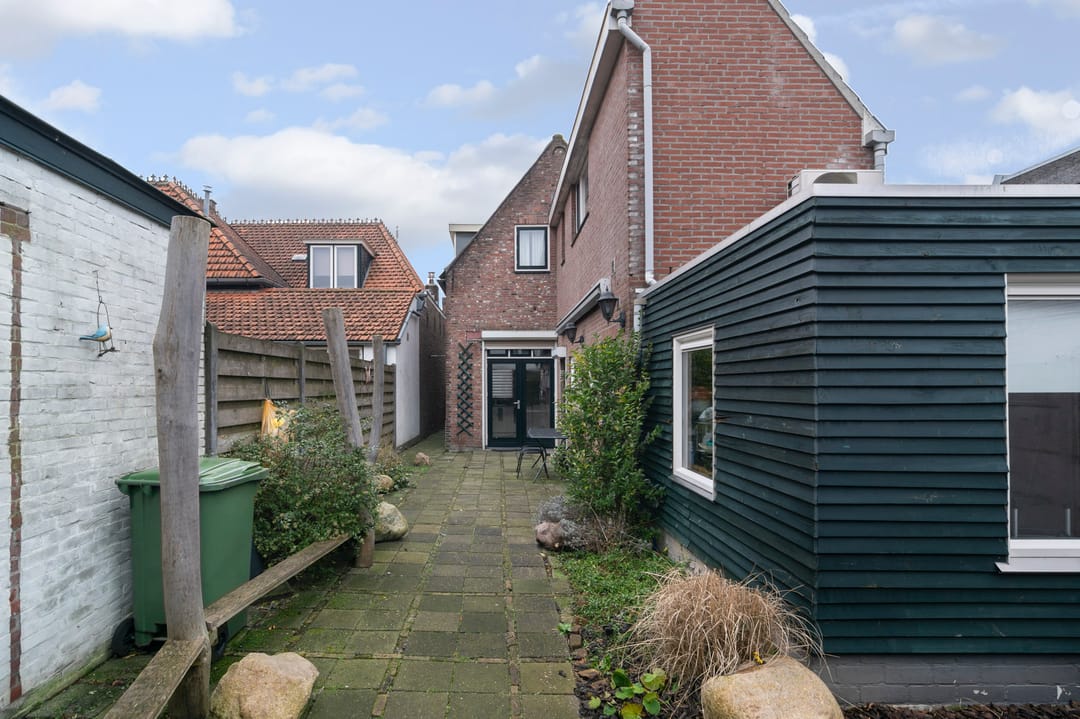 Foto 31 van Damstraat 42