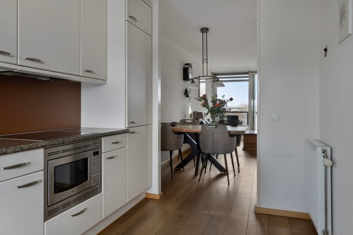 Foto 8 van Banier 69