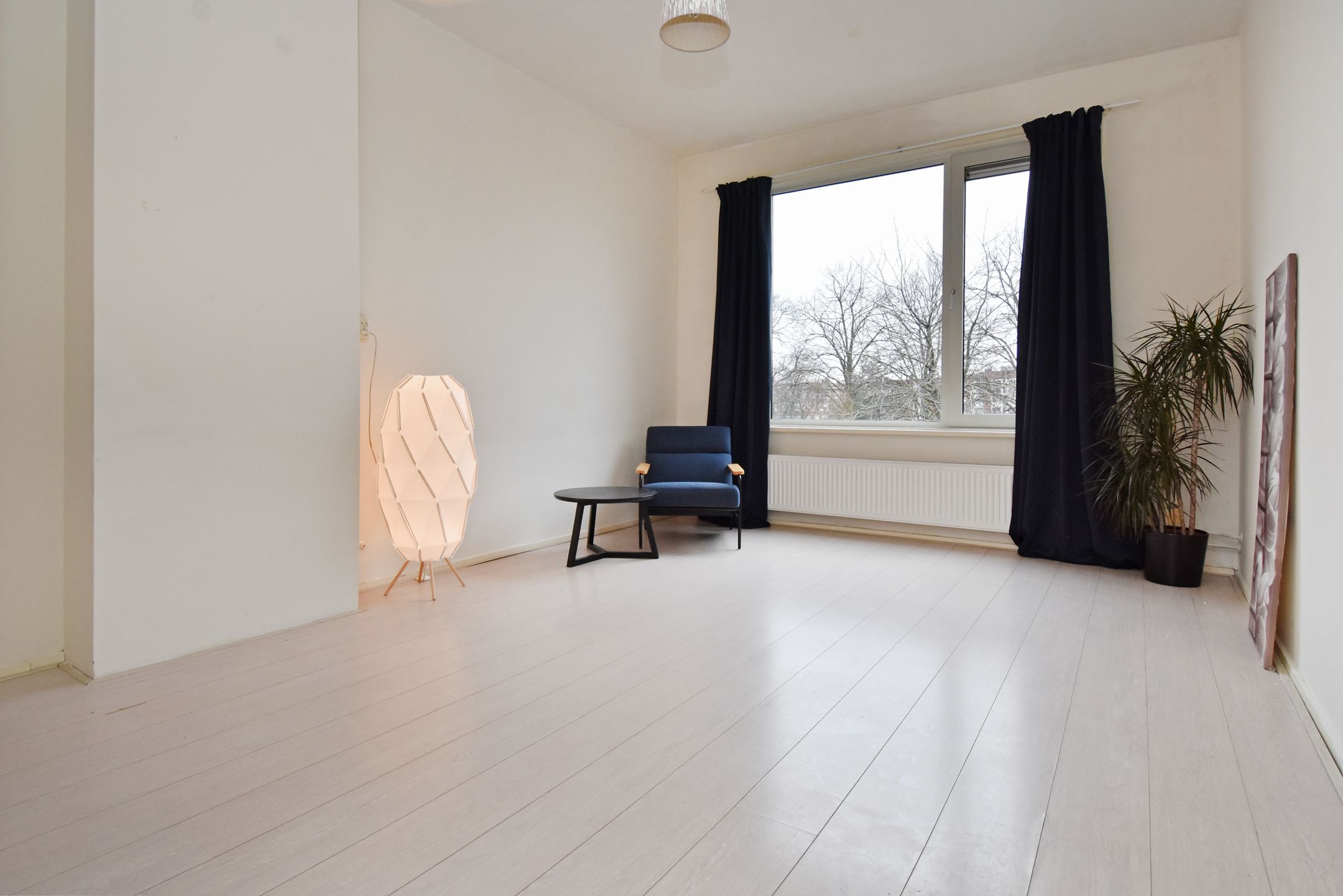 Foto 6 van Woudenbergstraat 125