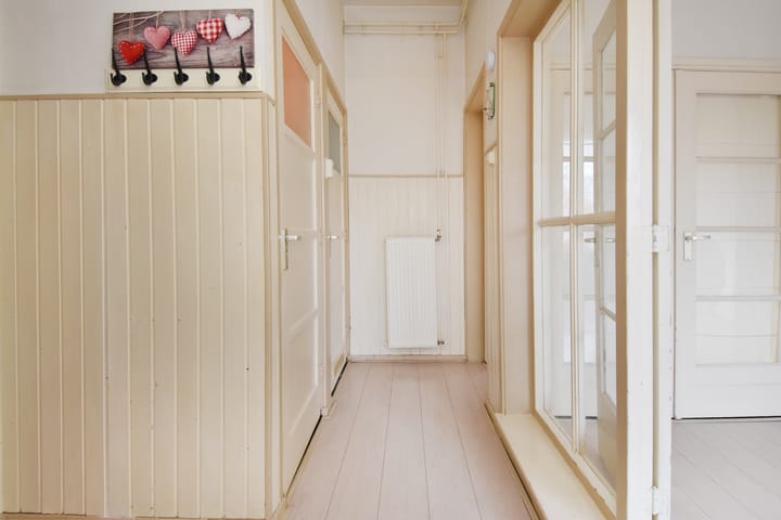 Foto 11 van Woudenbergstraat 125