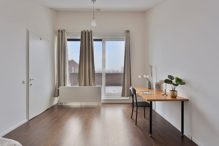 Foto 25 van van Vollenhovenstraat 33