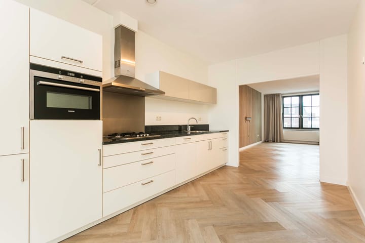 Foto 19 van J. Homan van der Heideplein 60