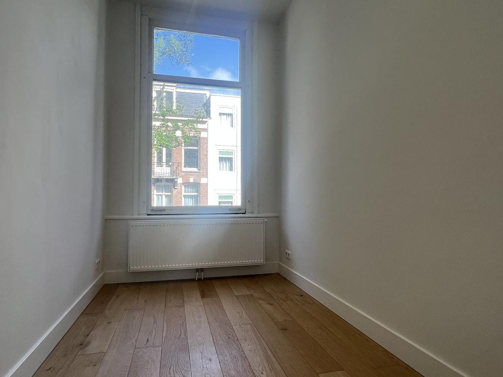 Foto 11 van Vrolikstraat 58-2