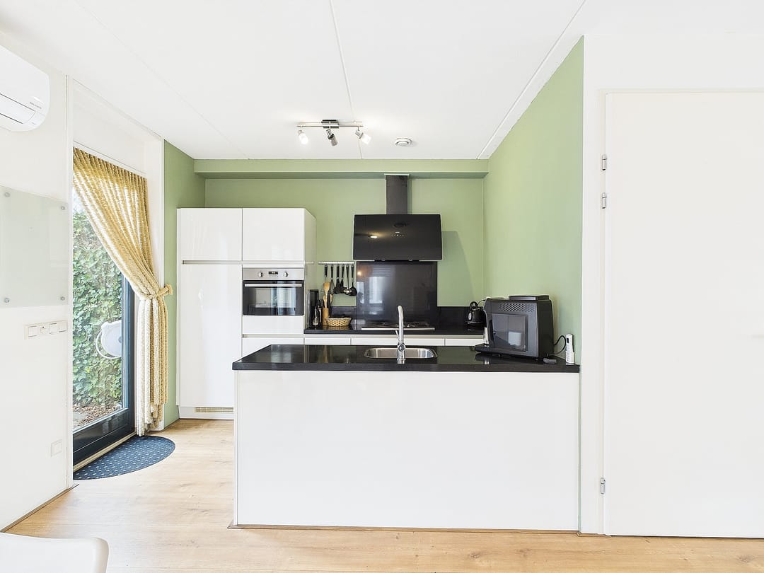 Foto 8 van Tapijtschelp 30