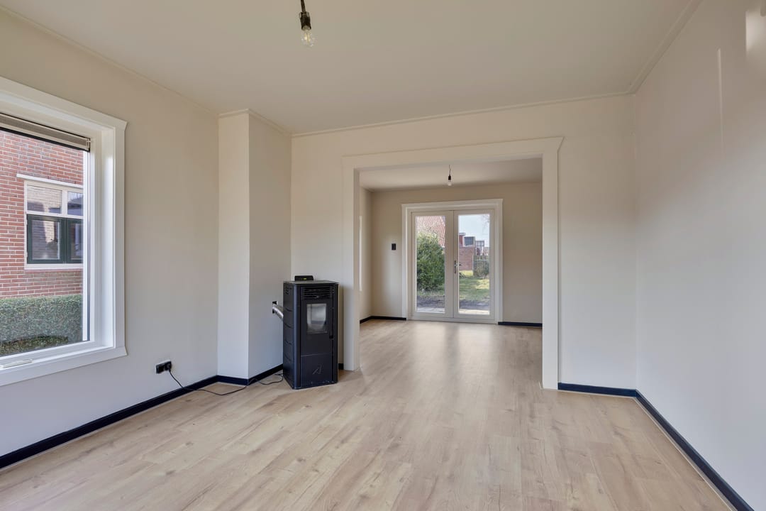 Foto 13 van Scharreweersterweg 36-B