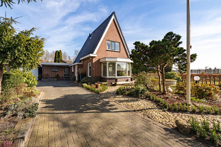 Bekijk foto van Emmerhoutstraat 84