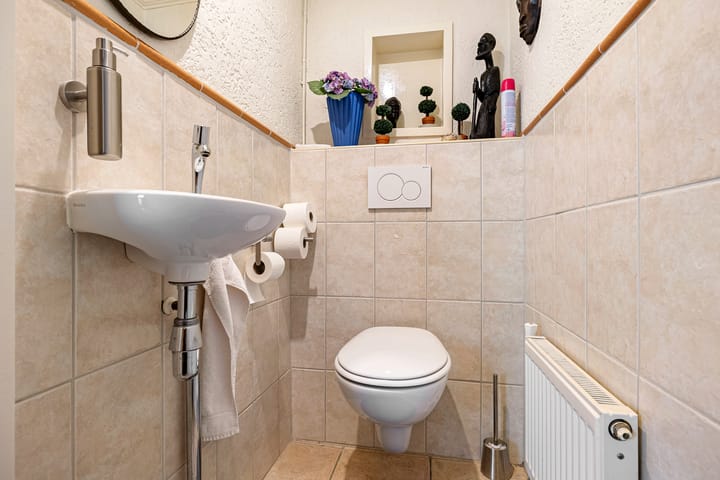 Foto 31 van Emmerhoutstraat 84