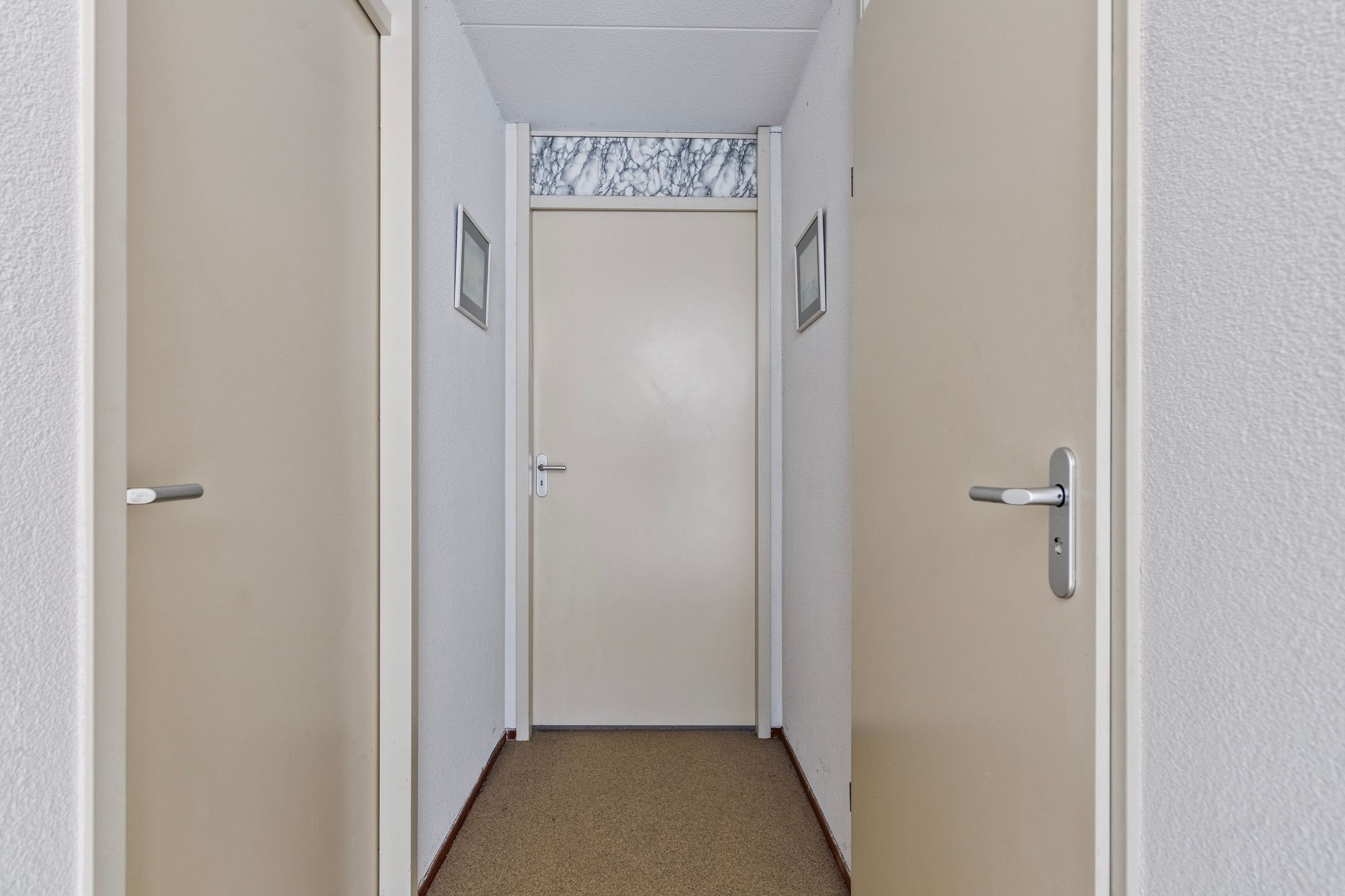 Foto 15 van Damstraat 84