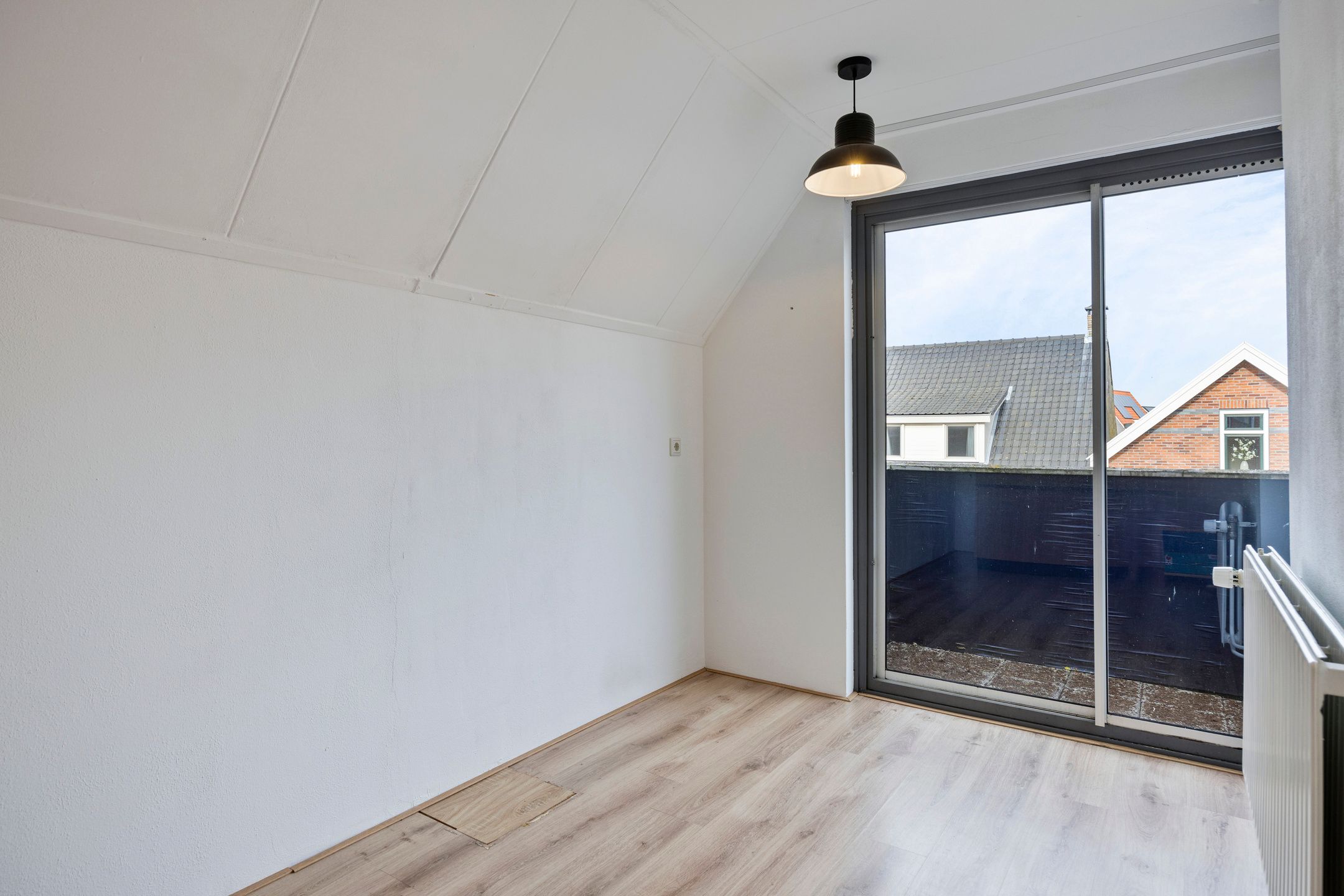 Foto 12 van Raadhuisstraat 32