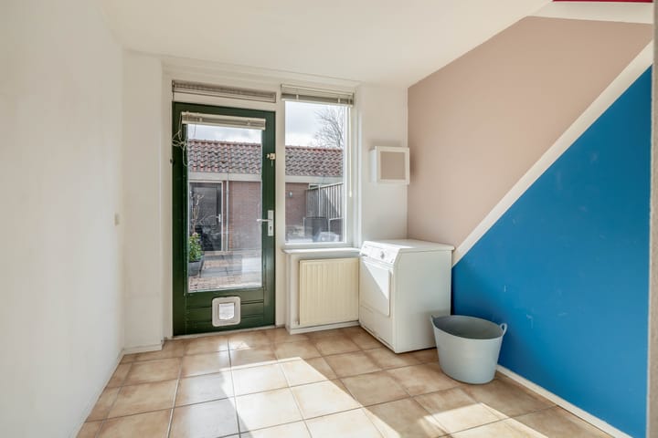 Foto 8 van Warmoezenierstraat 17