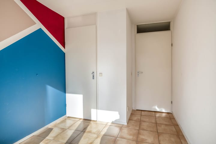 Foto 9 van Warmoezenierstraat 17