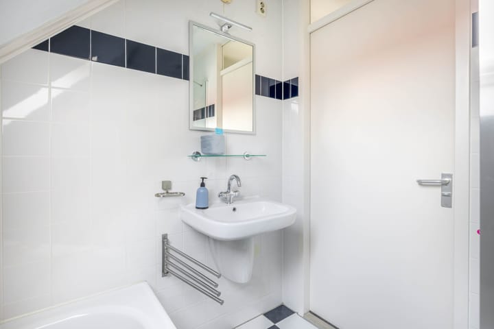 Foto 38 van Warmoezenierstraat 17