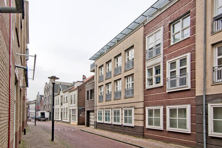 Bekijk foto van Damstraat 40
