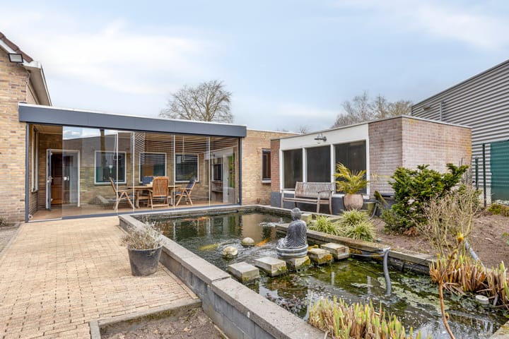 Foto 26 van Molenheiderweg 18