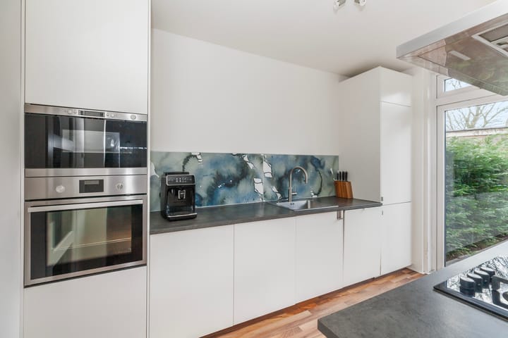 Foto 11 van Heiligenbloem 13