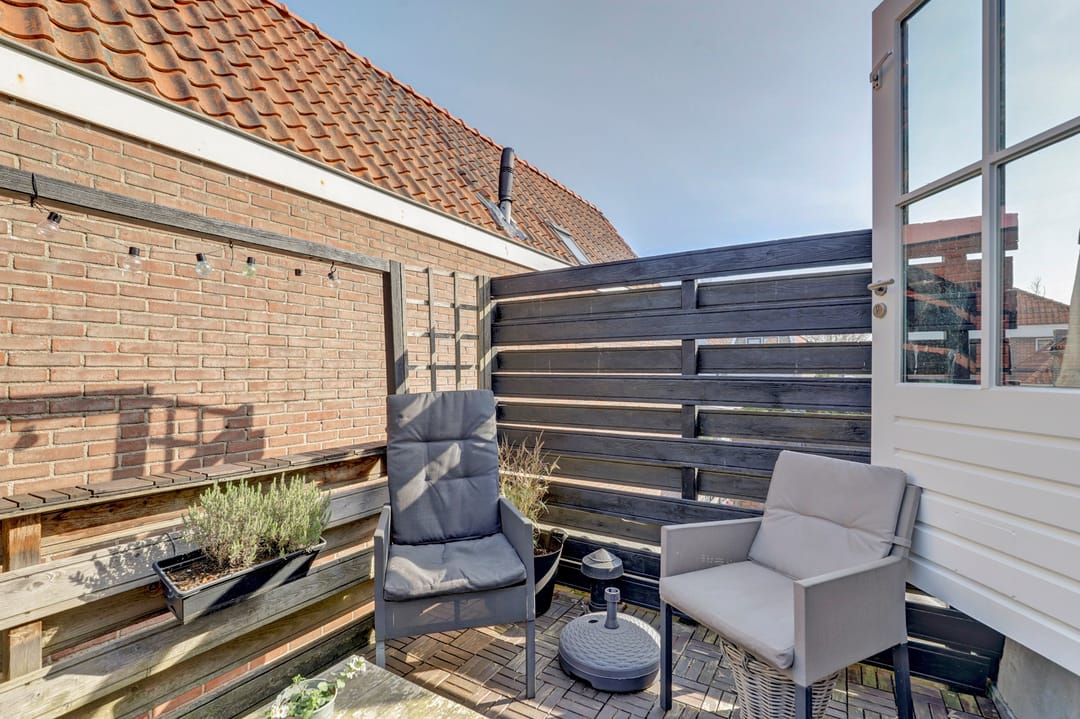 Foto 26 van Schuttershofstraat 41