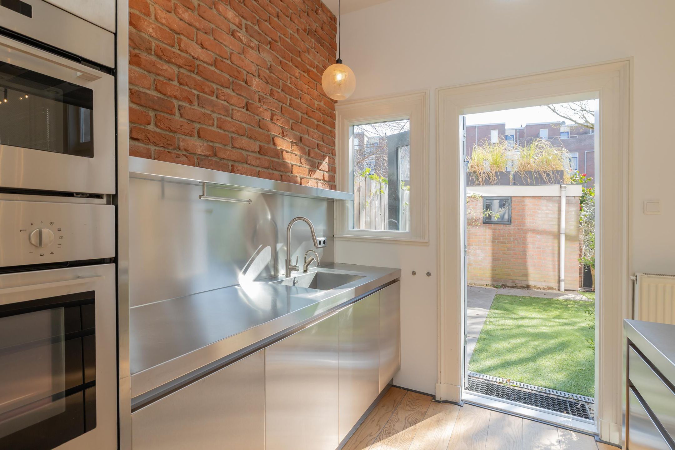 Foto 12 van Kinderhuisvest 11