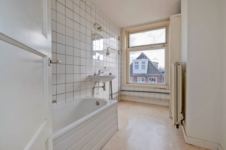 Foto 27 van Warmoesstraat 31-A