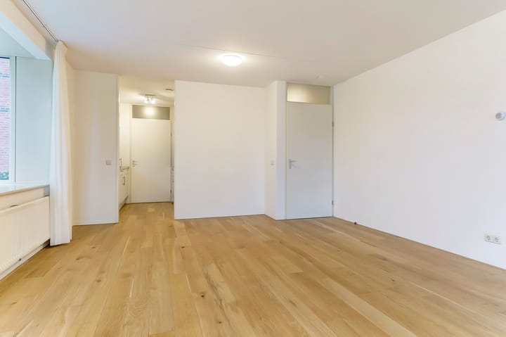 Foto 7 van Warmoeshof 38