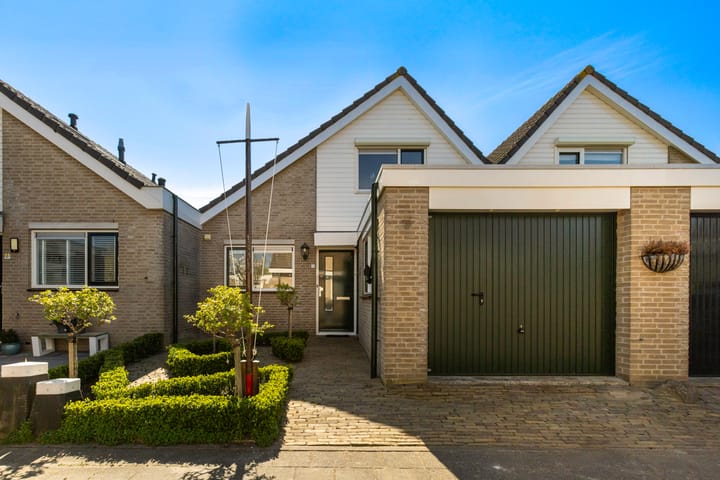 Foto 1 van Kompas 10