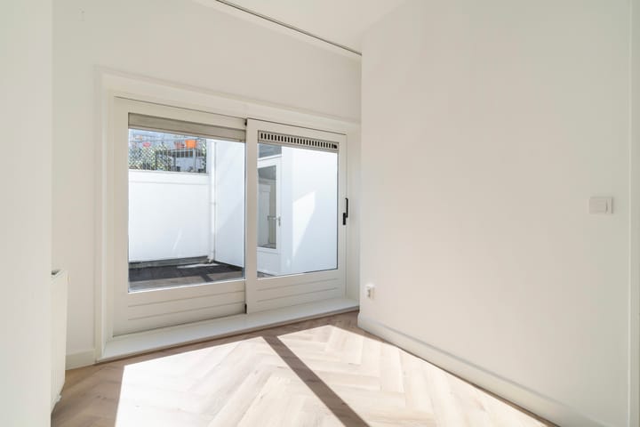 Foto 10 van Amsterdamse Veerkade 5-A