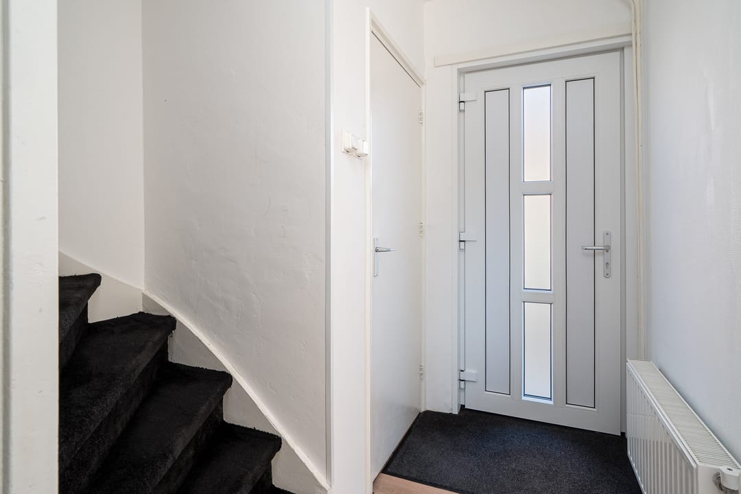 Foto 11 van Warmoezenierstraat 36