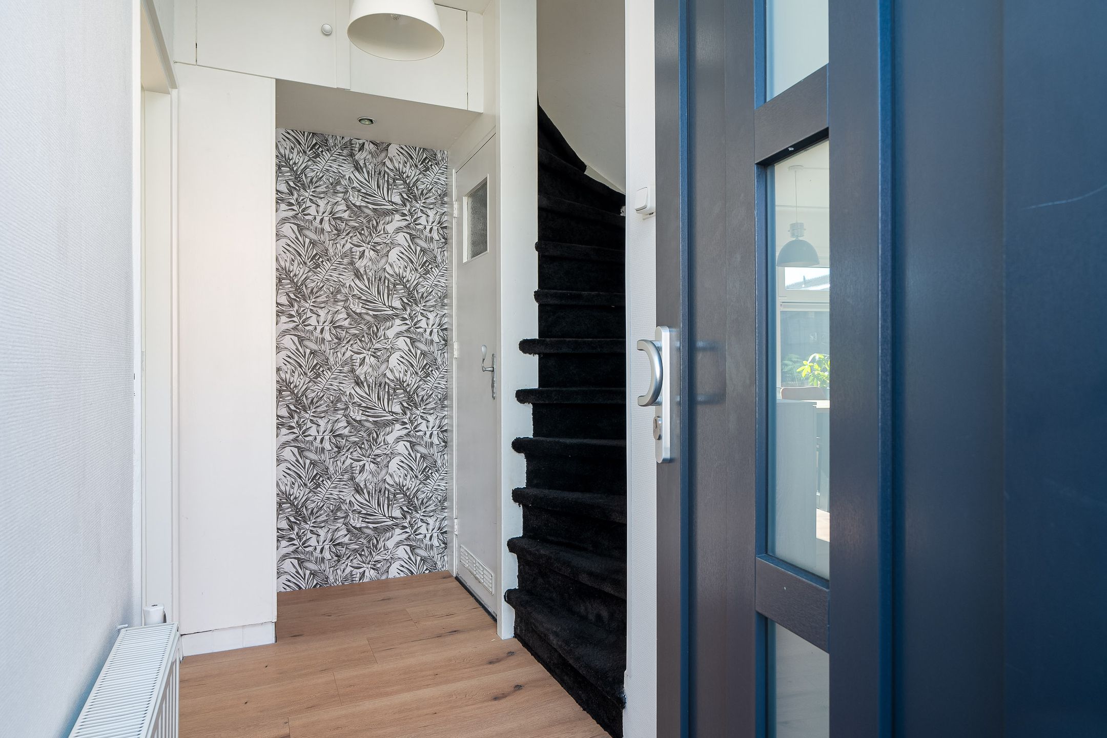 Foto 12 van Warmoezenierstraat 36