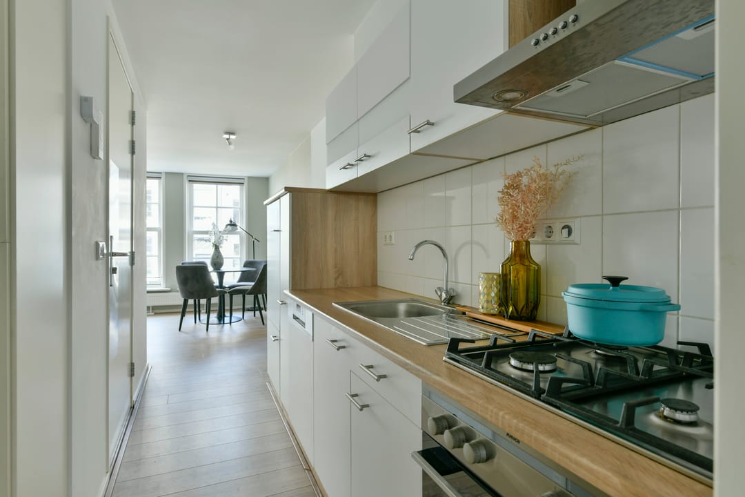 Foto 7 van Oudezijds Achterburgwal 127-1